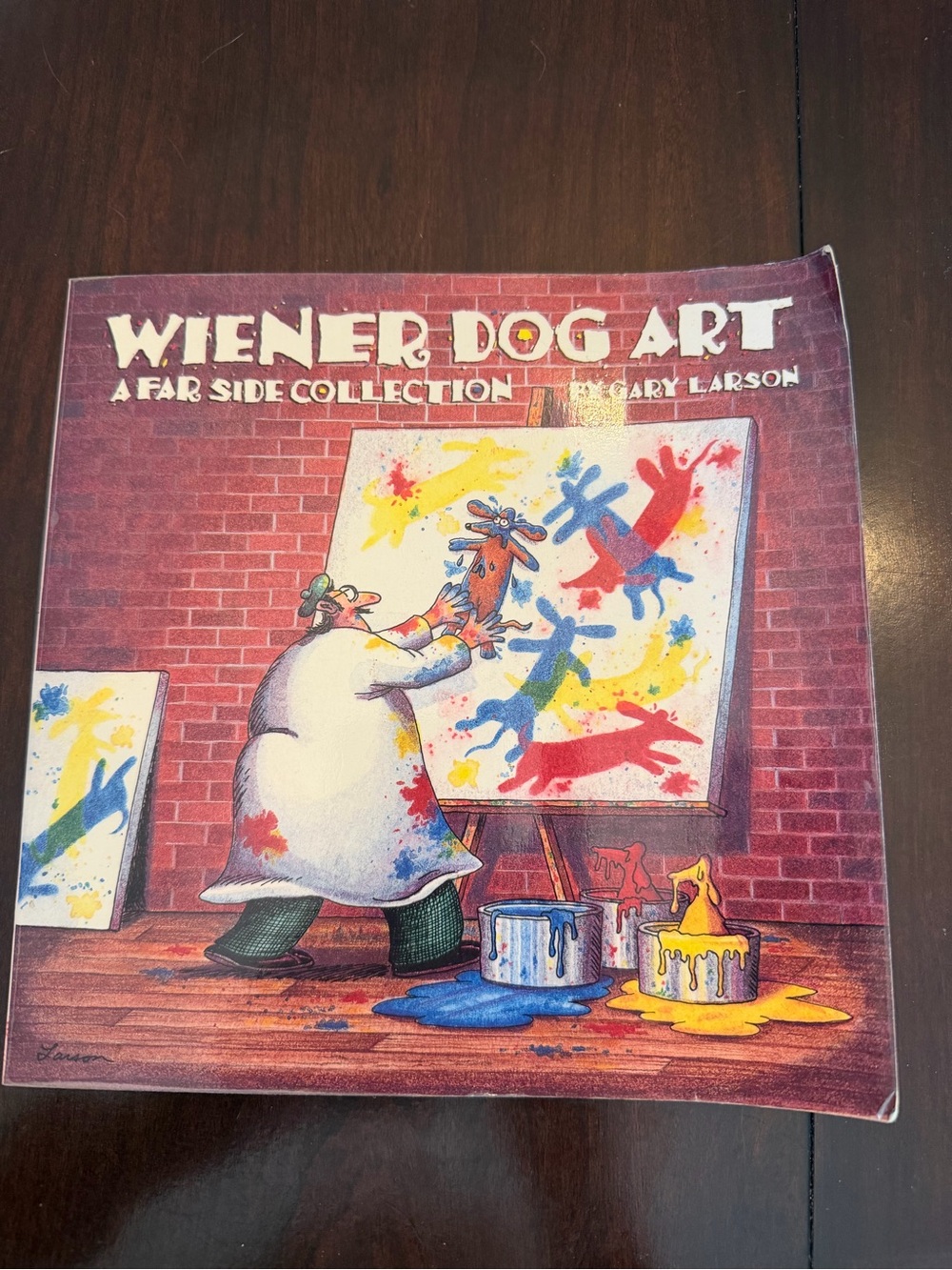 Wiener Dog Art A Far Side Collection by Gary Larson.  Paperback
